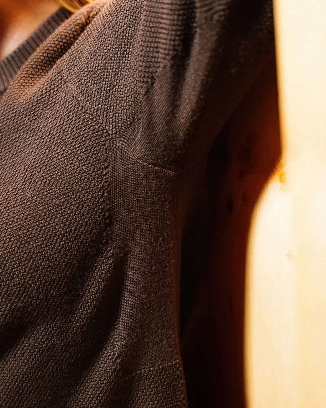 An image of someone putting their arm up