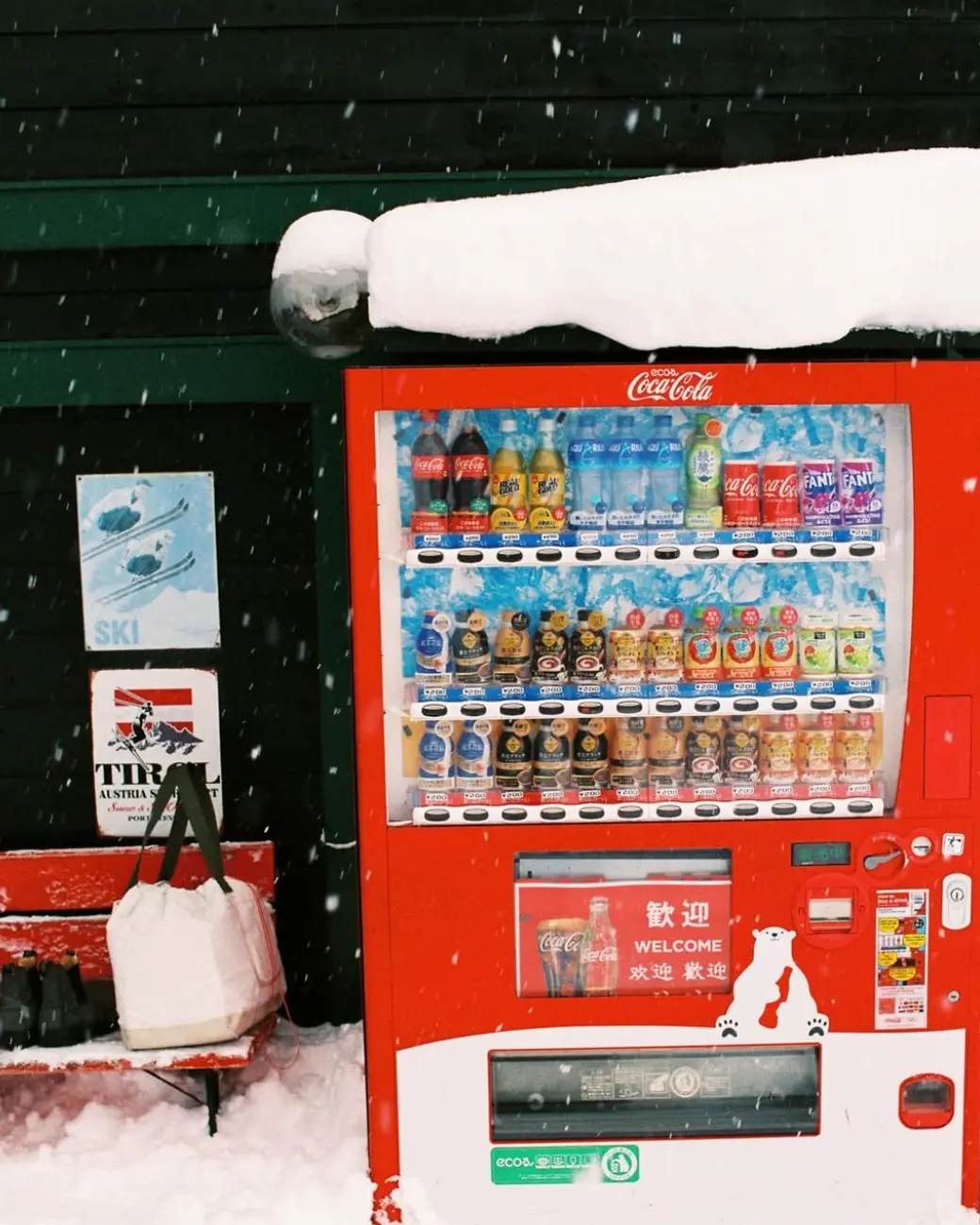 An image a of a vending machine in the snow