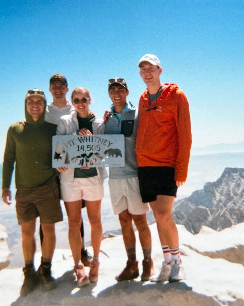 An image of people on top of a mountain
