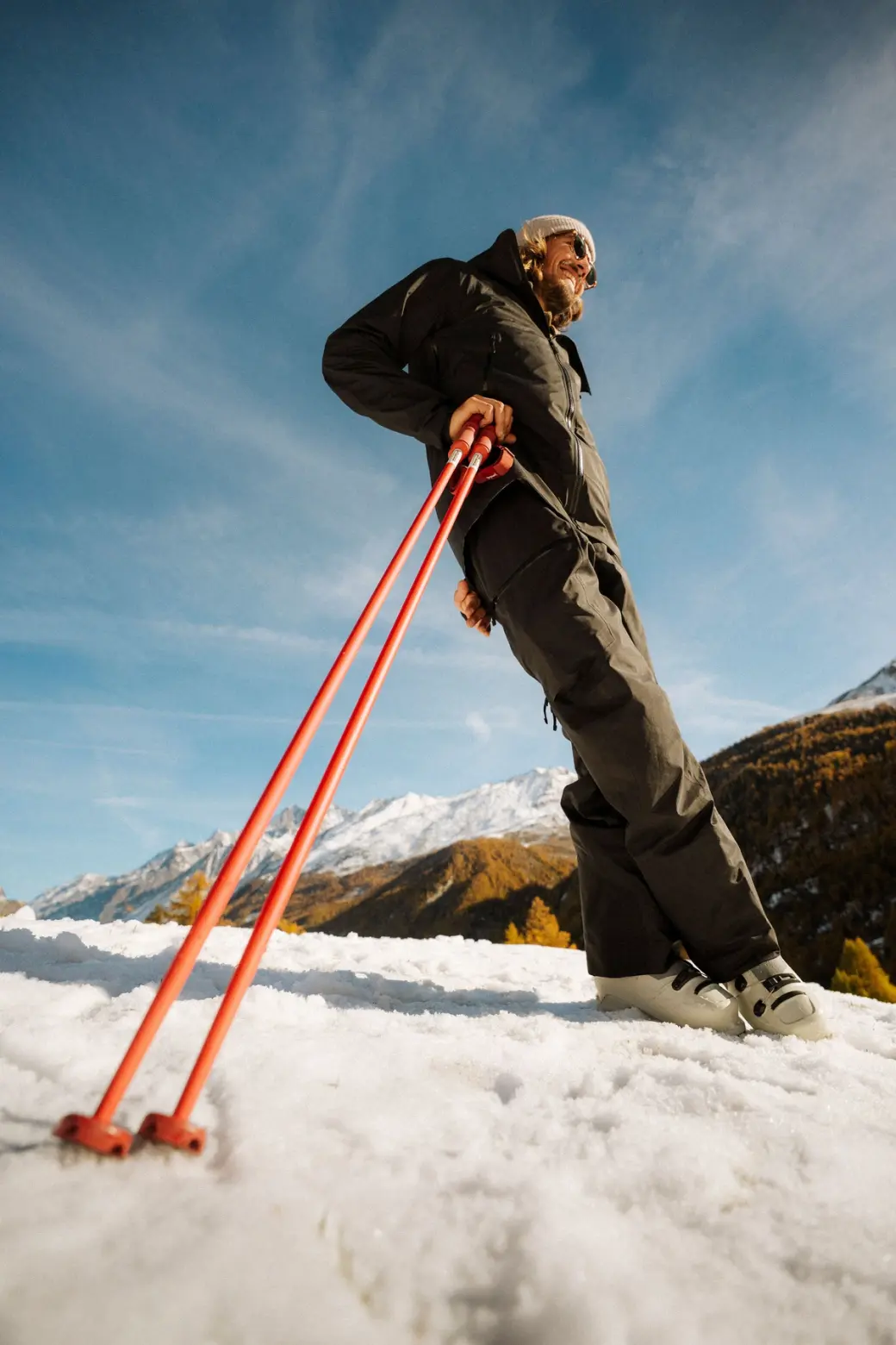 An image of a man carrying Yardsale ski poles 