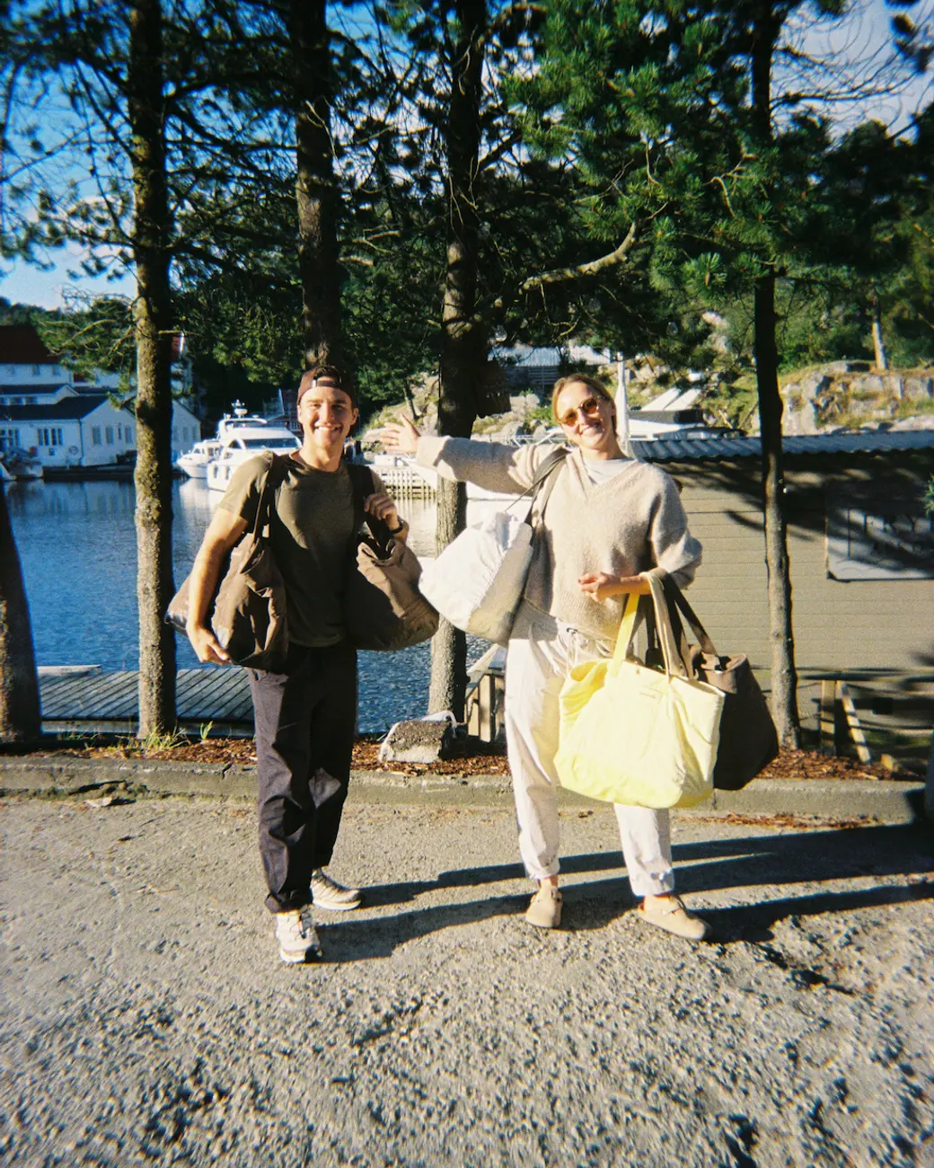 Kelly and Cristina standing with Day Bags