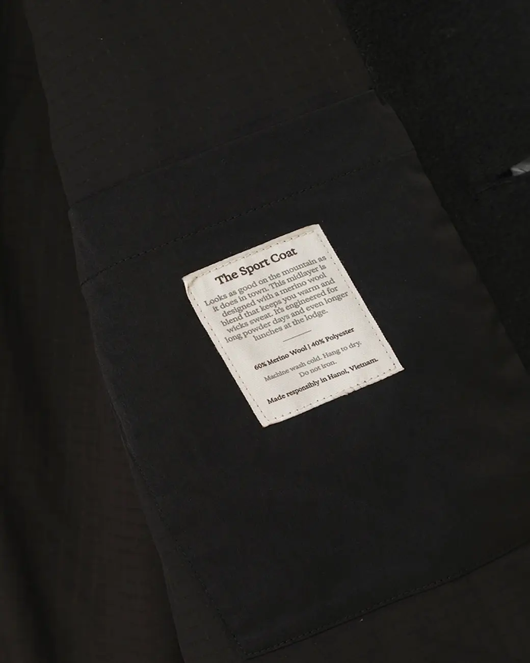 Midlayer black tag detail 