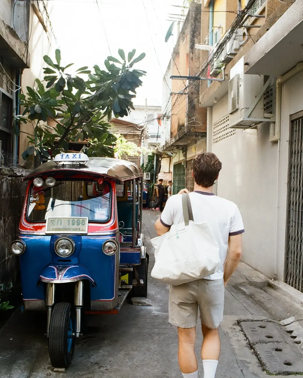 An image a of a person walking around Bangkok, Thailand